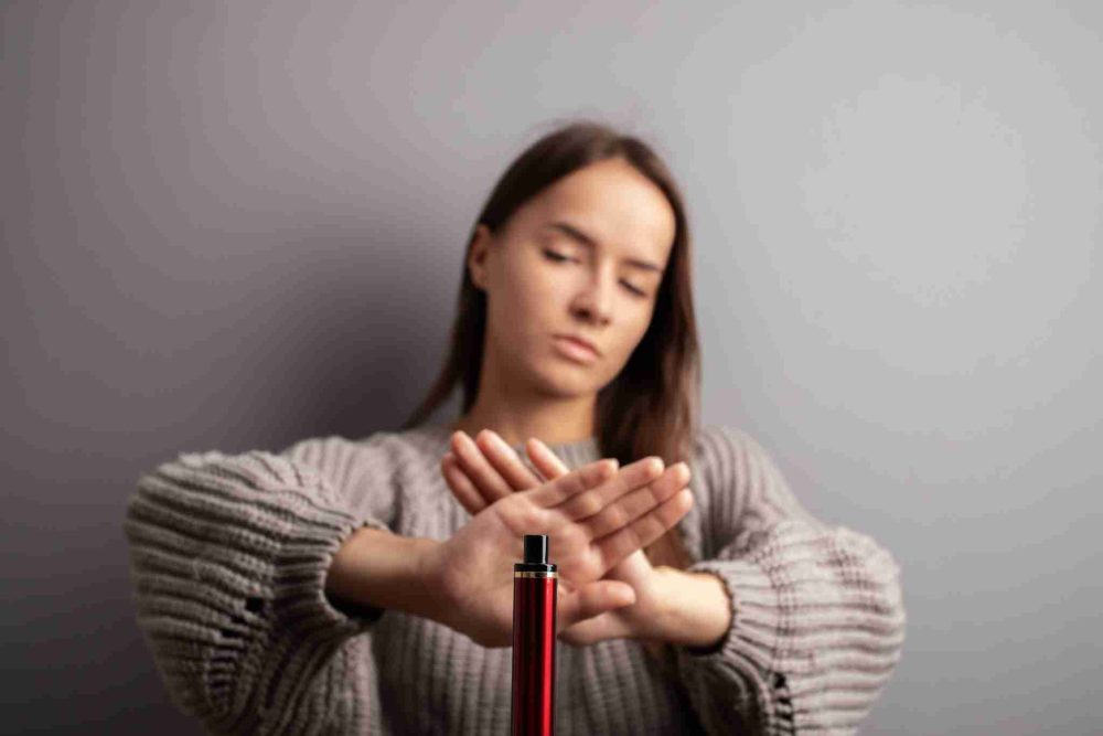 lady saying no to vape