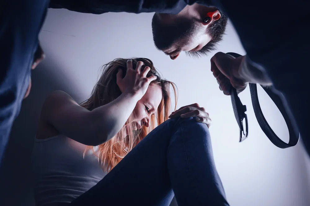 A man attacks a woman